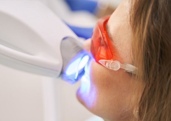 Patient undergoing Zoom whitening procedure